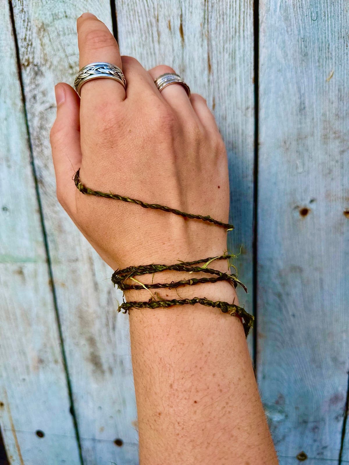 Hand-twisted nettle cord wound around a wrist